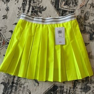 Wilson Yellow Tennis Skirt with Pleated Style for Athletic Occasions